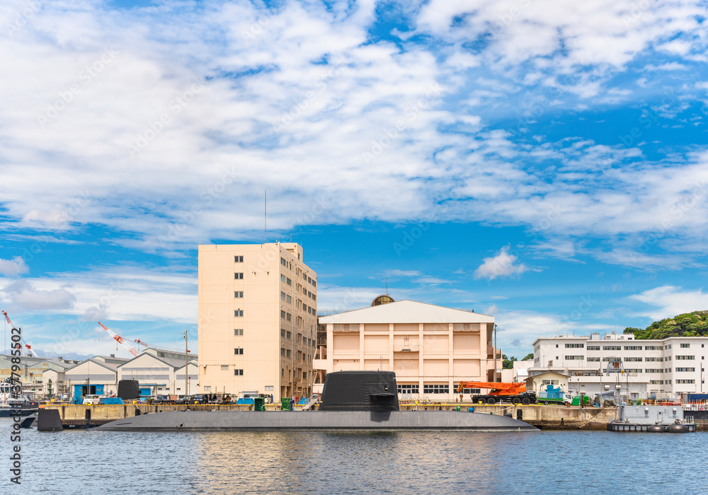 yokosuka, japan - july 19 2020: Japanese submarine Takashio berthed in front of the japan maritime self-defense force Second Diving Group Command in the Yokosuka naval port.
