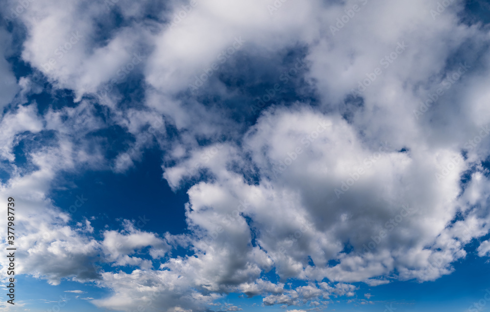 White cumulus clouds in blue sky high resolution background White cumulus clouds in blue sky high resolution background