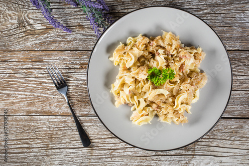 Pasta with sauerkraut and bacon. photo