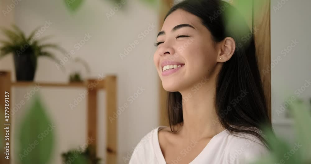 Beautiful korean woman smiling at home Beautiful korean woman smiling at home