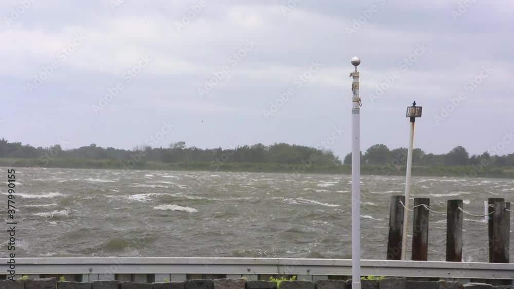 Waves crashing on pier during storm Waves crashing on pier during storm