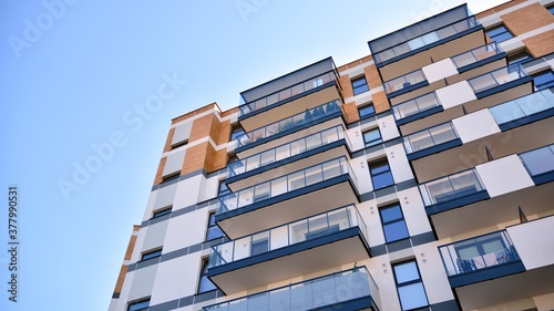 Architectural details of modern apartment building. Modern european residential apartment building complex.