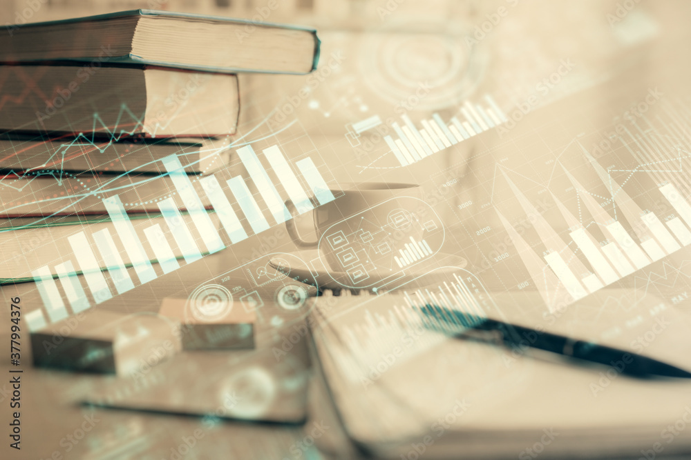 Double exposure of financial chart drawing and desktop with coffee and items on table background. Concept of forex market trading Double exposure of financial chart drawing and desktop with coffee and items on table background. Concept of forex market trading
