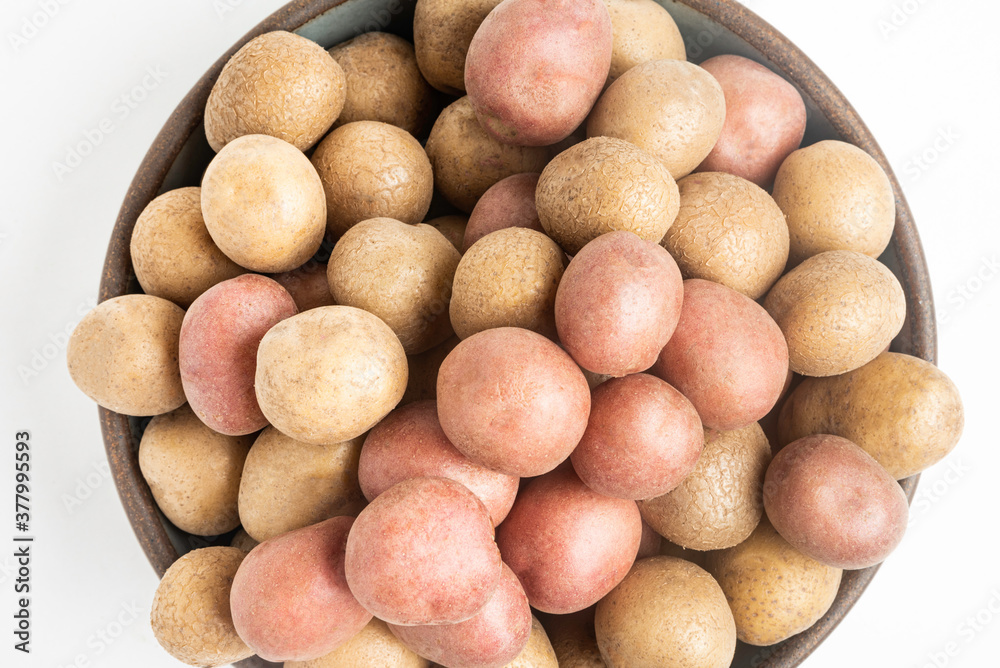 Top View Of Raw And Fresh Baby Potatoes In A Ceramic Bowl Top View Of Raw And Fresh Baby Potatoes In A Ceramic Bowl