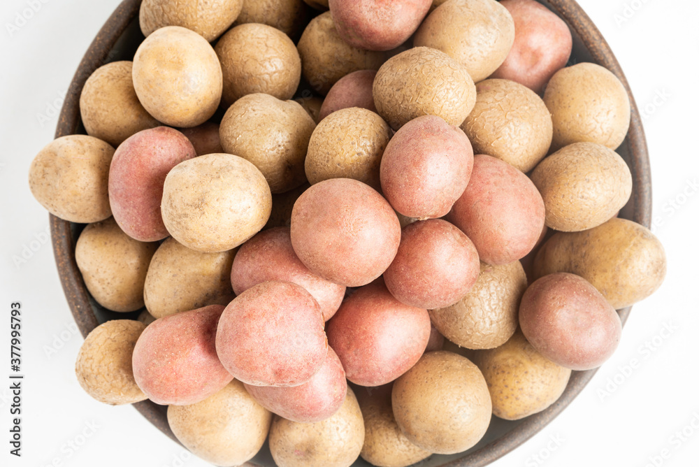 Top View Of Raw And Fresh Baby Potatoes In A Ceramic Bowl Top View Of Raw And Fresh Baby Potatoes In A Ceramic Bowl