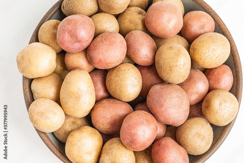 Top View Of Raw And Fresh Baby Potatoes In A Ceramic Bowl Top View Of Raw And Fresh Baby Potatoes In A Ceramic Bowl