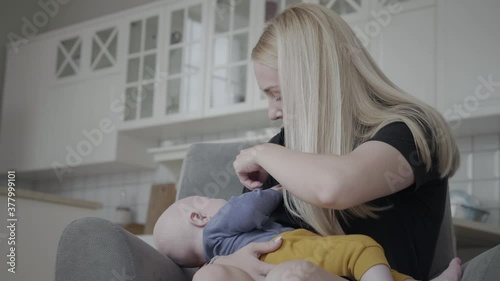 Mother calms and lulls the child