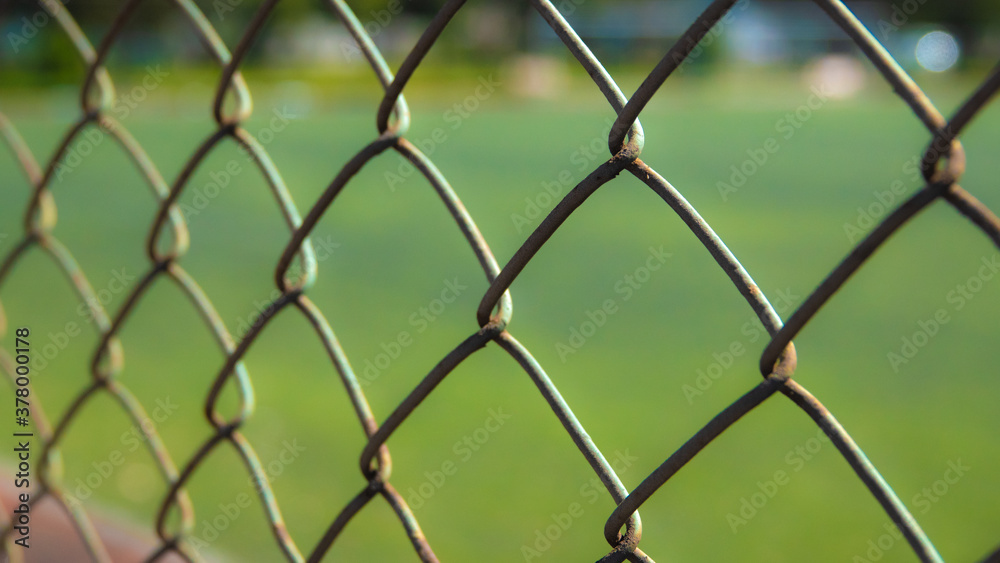 Astroturf corner surrounded by iron wires Astroturf corner surrounded by iron wires