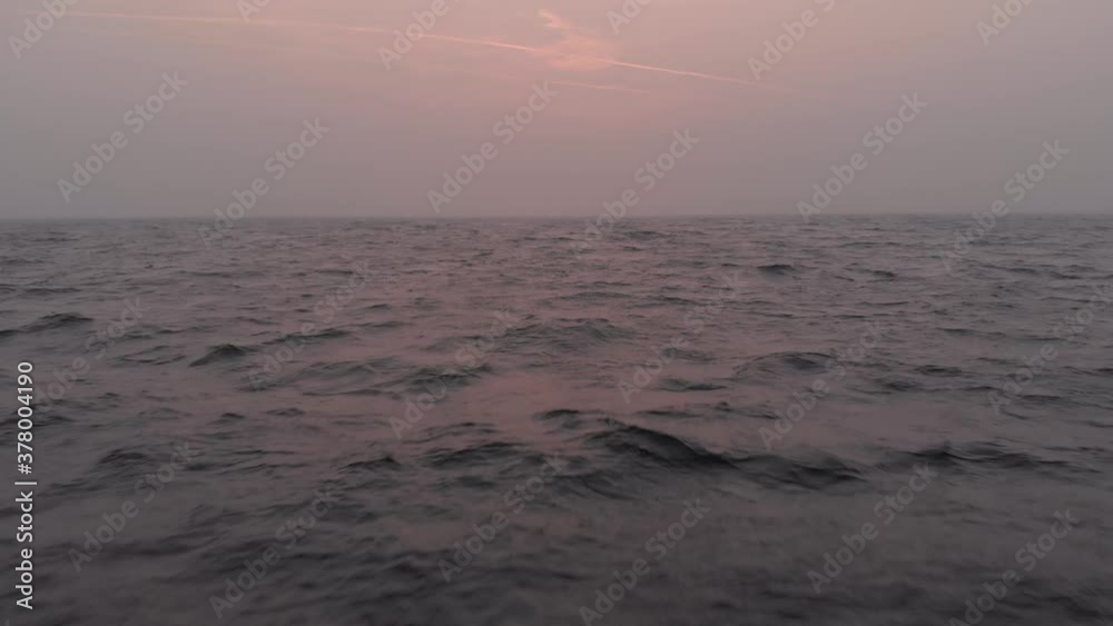 A view of the setting sun and ocean obscurred by Oregon wildfire smoke near Sooke, BC. 4K 24FPS. A view of the setting sun and ocean obscurred by Oregon wildfire smoke near Sooke, BC. 4K 24FPS.