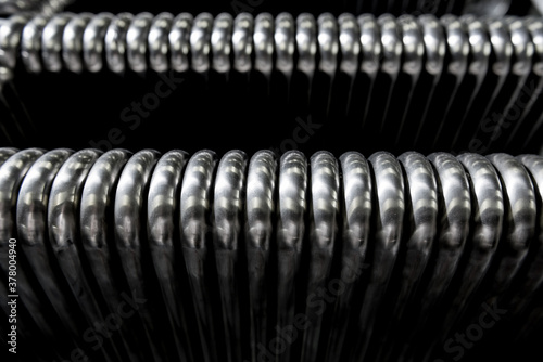 Abstract industrial background of metal pipes construction.