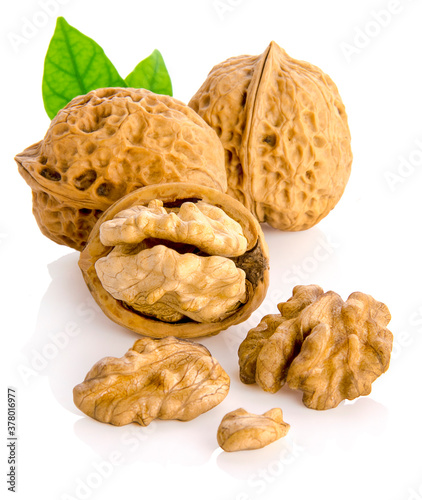 Walnuts with leaf isolated on white.
