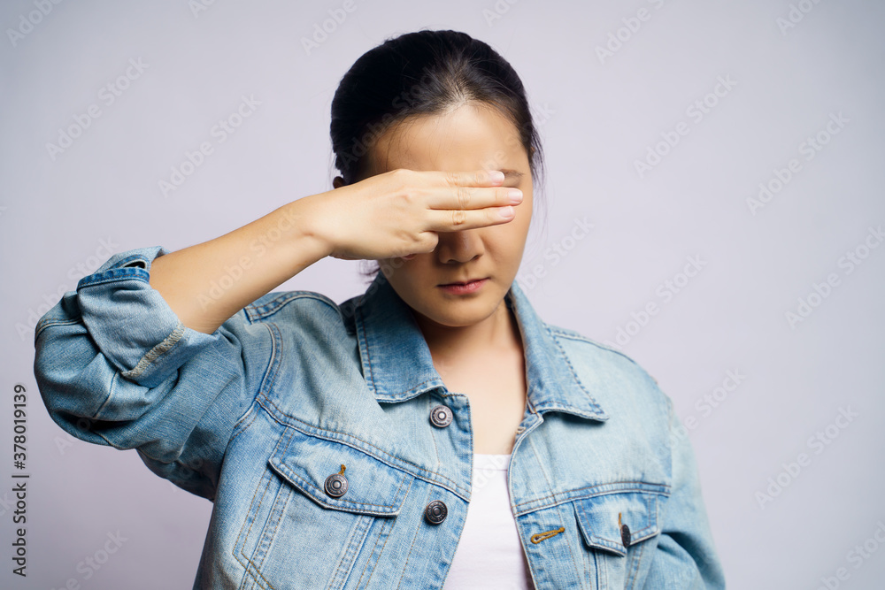 Asian woman showing three finger isolated over white background. Asian woman showing three finger isolated over white background.