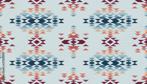 Tribal ethnic multicolored geometric triangle pattern seamless vector abstract background 