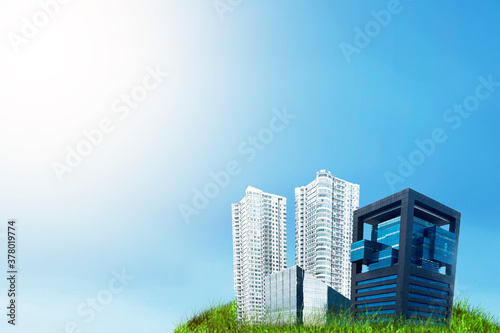 Land with buildings and apartments with a blue sky background