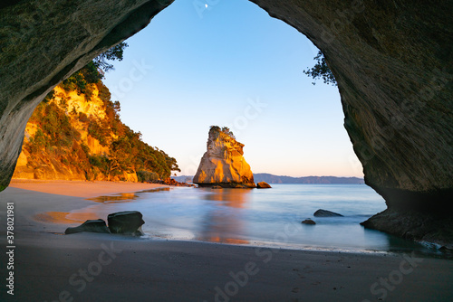 Sunrise at Cathedral Cove  on Coromandel Peninsula New Zealand photo