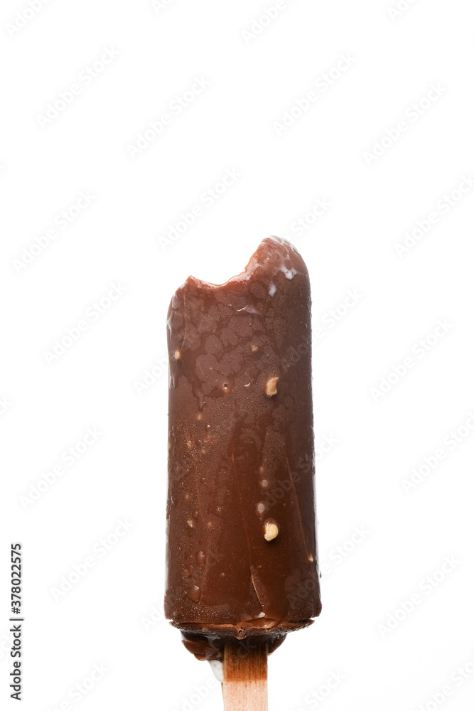 A closeup levitation picture of bitten coco bar ice cream with vanilla flavour on isolated white background A closeup levitation picture of bitten coco bar ice cream with vanilla flavour on isolated white background