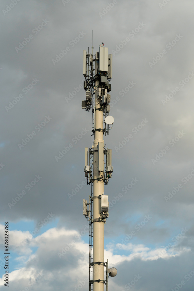 RF Communication tranmission towers under cloudy sky RF Communication tranmission towers under cloudy sky