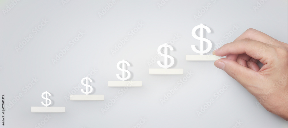 Block stacking as step stair in hand. Business concept for growth Block stacking as step stair in hand. Business concept for growth