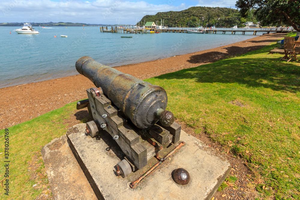 An old cannon on the waterfront at Russell in the Bay of Islands, New Zealand. It was used to defend the town in the 1840s