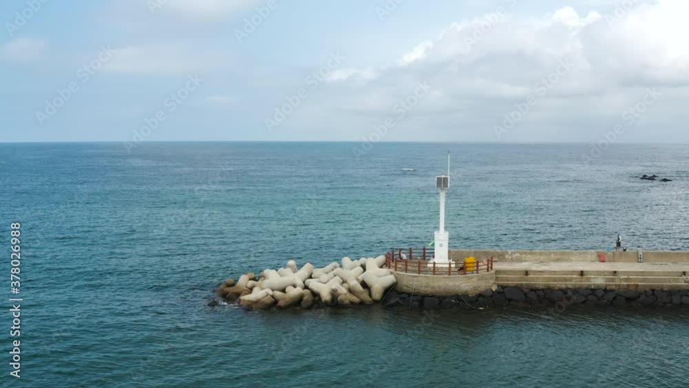 A small port in a secluded country village. Jeju Island in Korea. A small port in a secluded country village. Jeju Island in Korea.