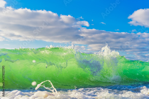 Sea wave close up, low angle view, sunrsie shot photo