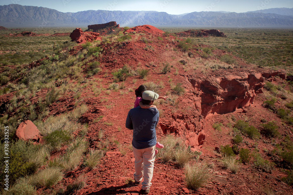 Φωτογραφία person walking in the desert Los Colorados, La Rioja, Argentina