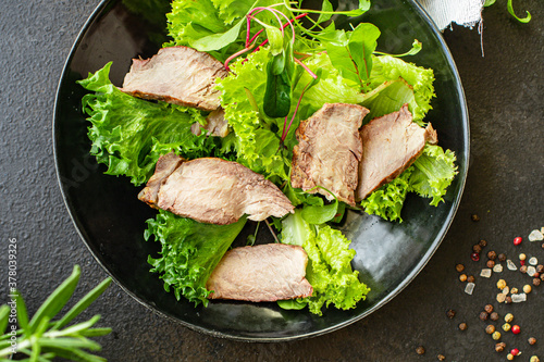 meat salad slice vegetables juicy veal meat on the table tasty serving size portion top view copy space for text keto or paleo diet