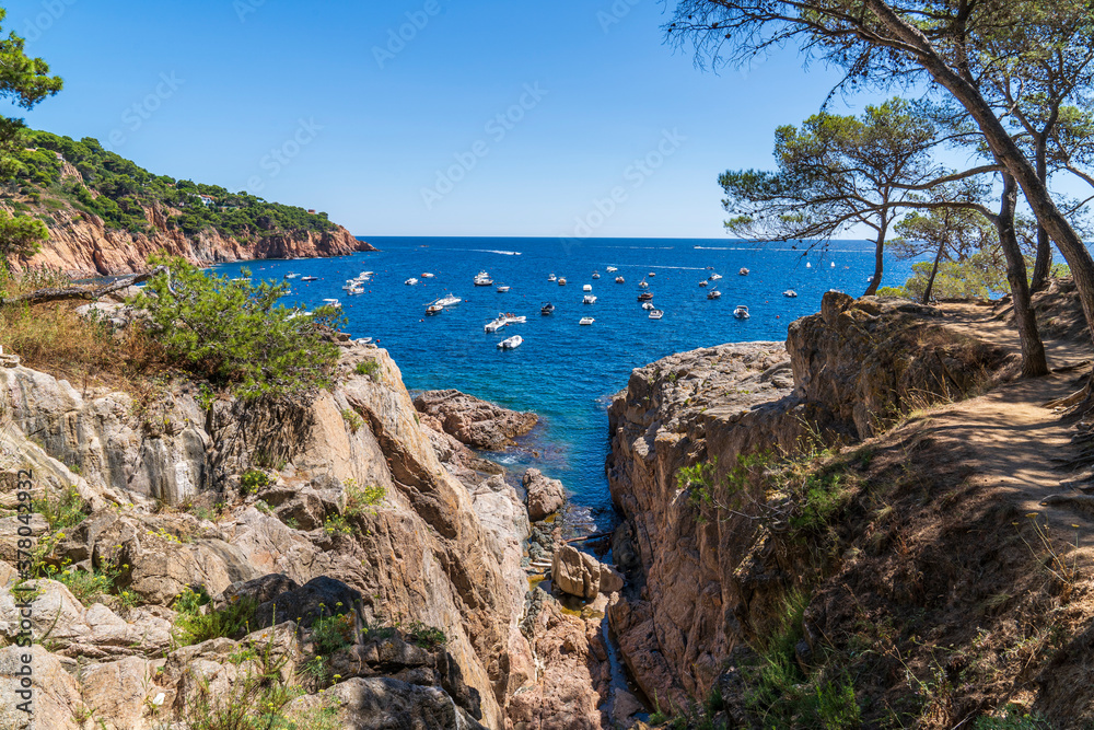 Fototapeta premium Views of the coast near Tamariu beach with boats.