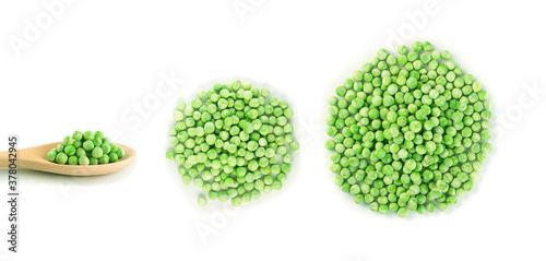 Heap of Frozen Sweet Green Peas in Wooden Spoon