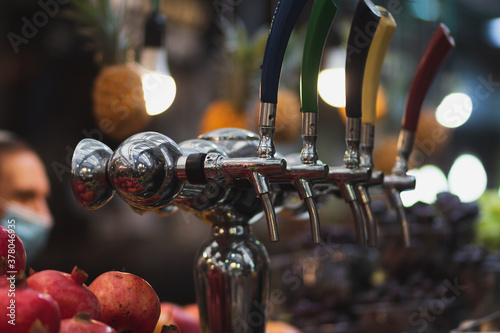 Beer taps in the Mahane Yehuda market in Jerusalem photo