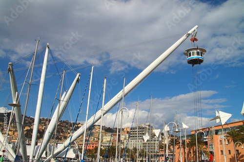 Ancient port of Genoa: The pillars that support the skating rink and the Bigo (panoramic lift on the right)