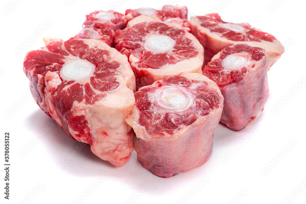 Pile of fresh raw ox tail portion on white background. Meat industry concept - obrazy, fototapety, plakaty 