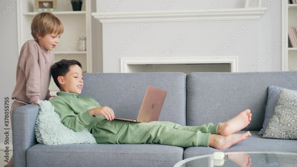 Video Call. Distance Education. Schoolboy Video Call Via Laptop Talking to Mom. Talking With Kid Video Calling Using Computer. Home Conference Children Education Video Call. Distance Education. Schoolboy Video Call Via Laptop Talking to Mom. Talking With Kid Video Calling Using Computer. Home Conference Children Education
