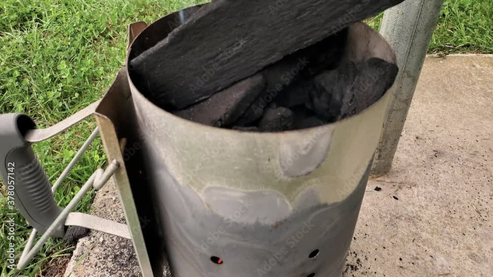 Close up vertical panning footage of a classical charcoal chimney