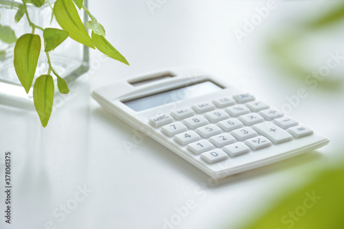  Calculator on a white desk