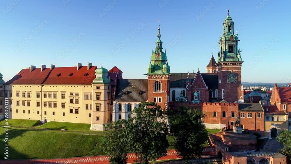 Historic royal Wawel cathedral and castle and in Cracow, Poland. Aerial flyby 4K video in sunrise light, early morning in summer Historic royal Wawel cathedral and castle and in Cracow, Poland. Aerial flyby 4K video in sunrise light, early morning in summer