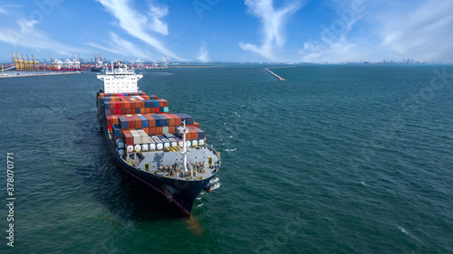 Container ship, Freight shipping maritime vessel, Global business import export commerce trade logistic and transportation oversea worldwide by container cargo ship boat, Aerial view.