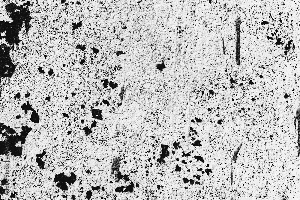 Texture of a concrete wall with cracks and scratches which can be used as a background Texture of a concrete wall with cracks and scratches which can be used as a background