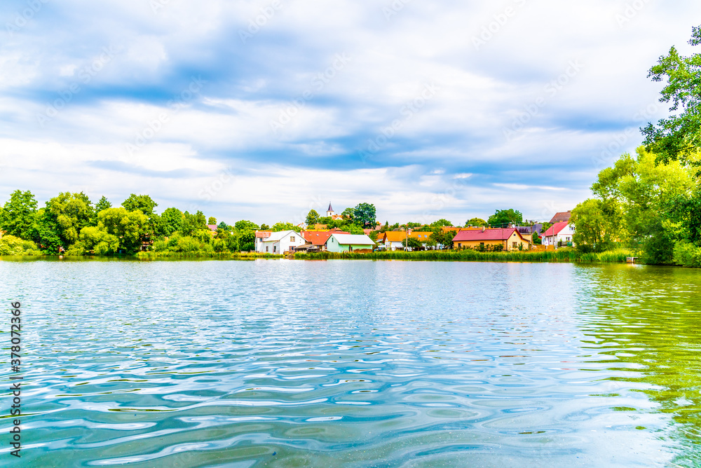 Obraz premium Rural pond in the village of Borotin, Southern Bohemia, Czech Republic
