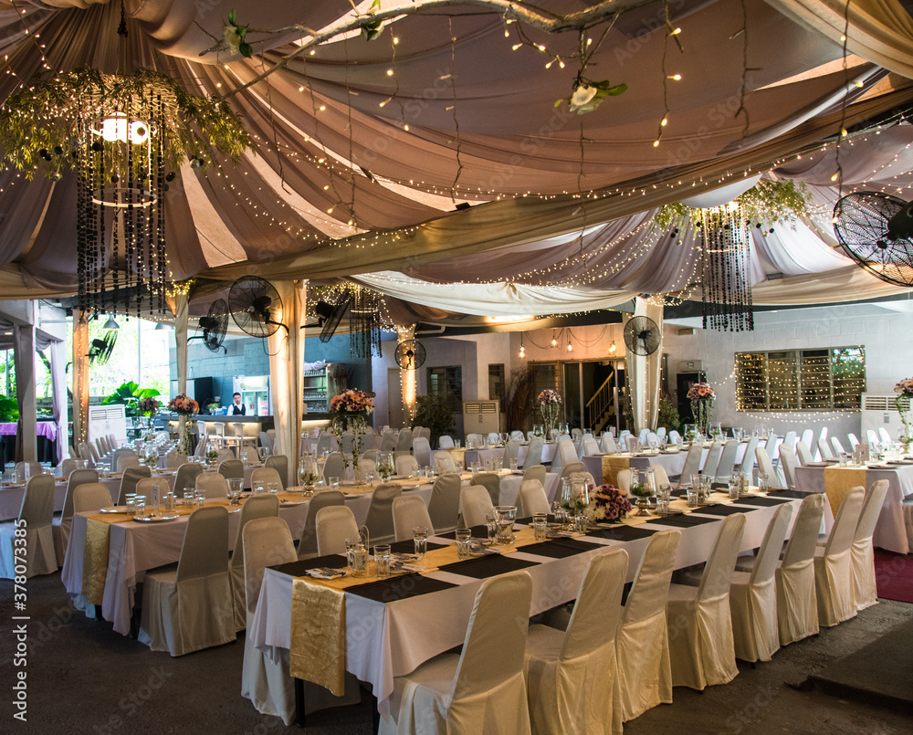 Fototapeta premium gorgeous wedding chair and table setting for fine dining at outdoors