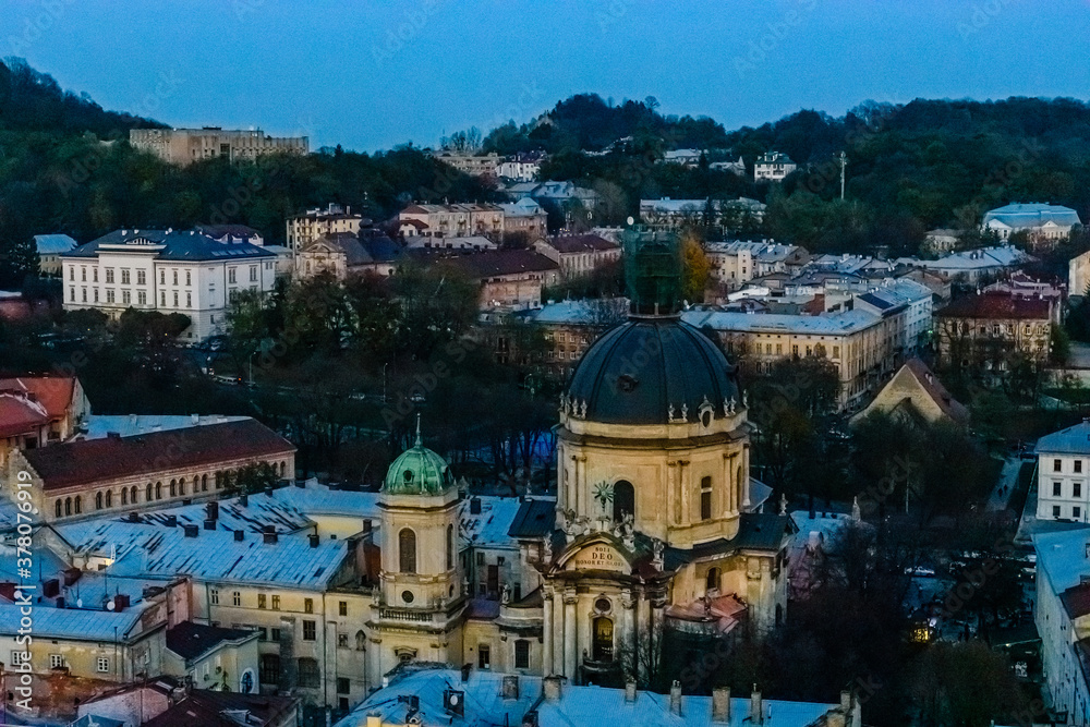 View on Dominican cathedral and historic center of the Lviv at sunset. View on Lvov cityscape from the town hall