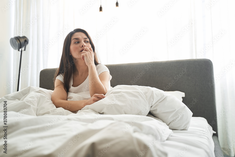 Pensive cute woman staring into the distance Pensive cute woman staring into the distance