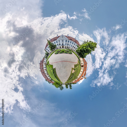 little planet transformation of spherical panorama 360 degrees. Spherical abstract aerial view in field with clear sky and awesome beautiful clouds. Curvature of space. © hiv360