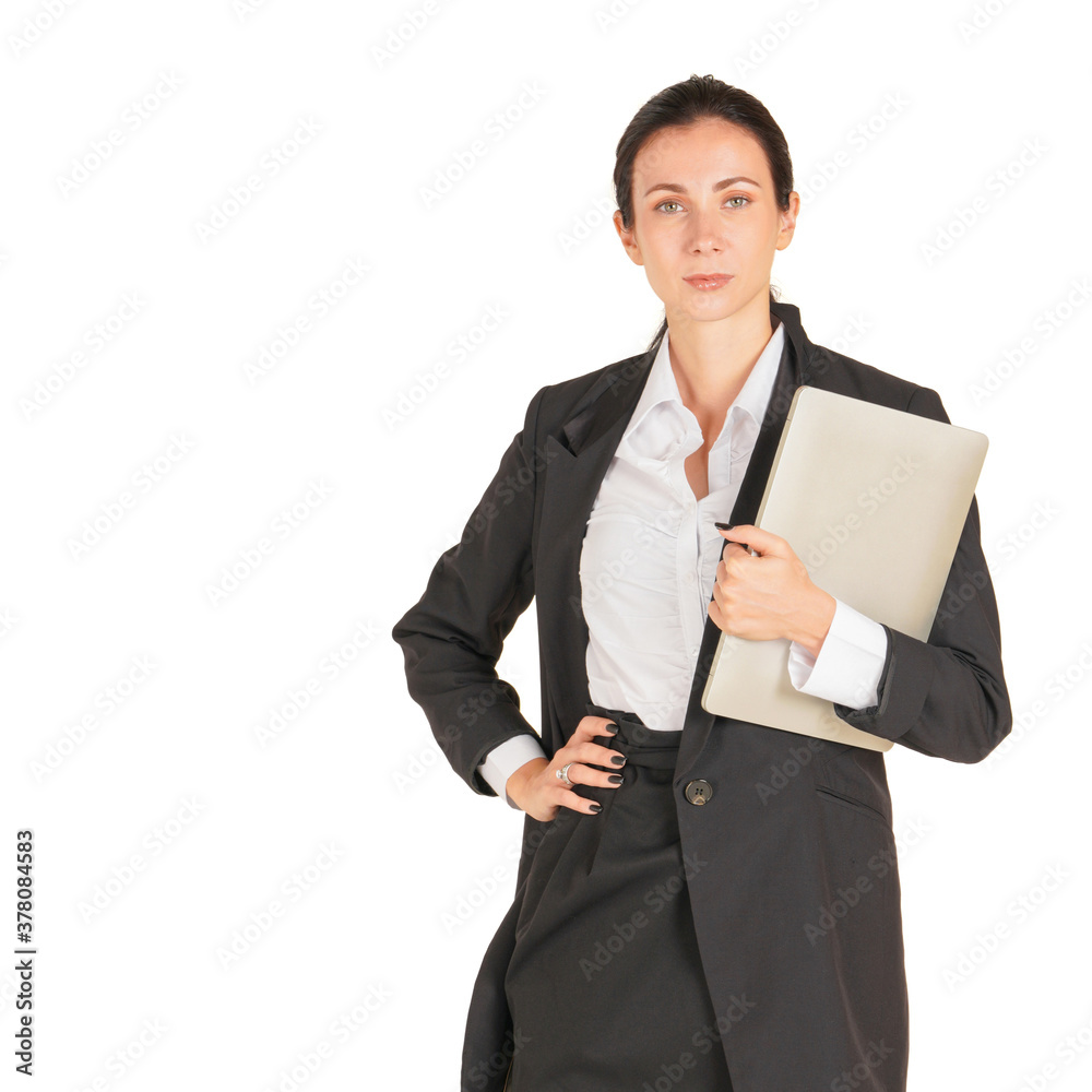 A business woman in a black suit holding on a computer notebook. A business woman in a black suit holding on a computer notebook.