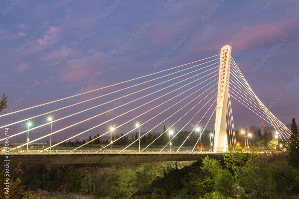 Night view on the famous cable-stayed Milenium Bridge in Podgorica. Montenegro