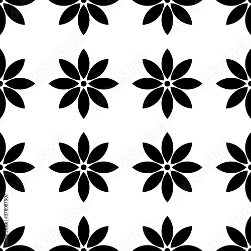 Vector seamless pattern. Texture with black geometric flower. Repeating abstract background with black flower on white back.