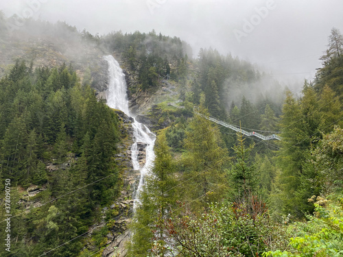 Stuibenfall is dramatic cascade falling 159 meters, Austria. photo