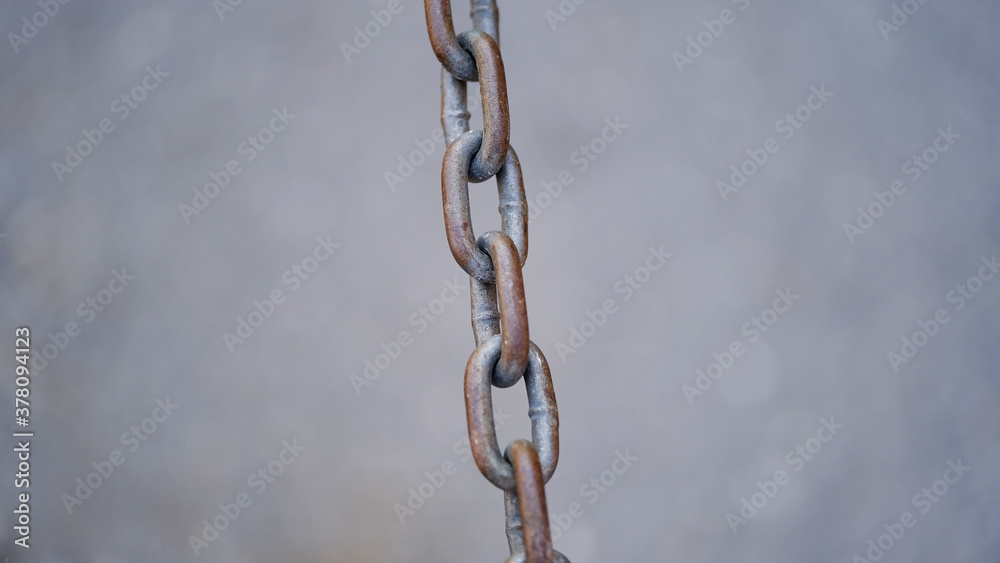 Old rusty metal chain on a blurred background
Old rusty metal chain on a blurred background