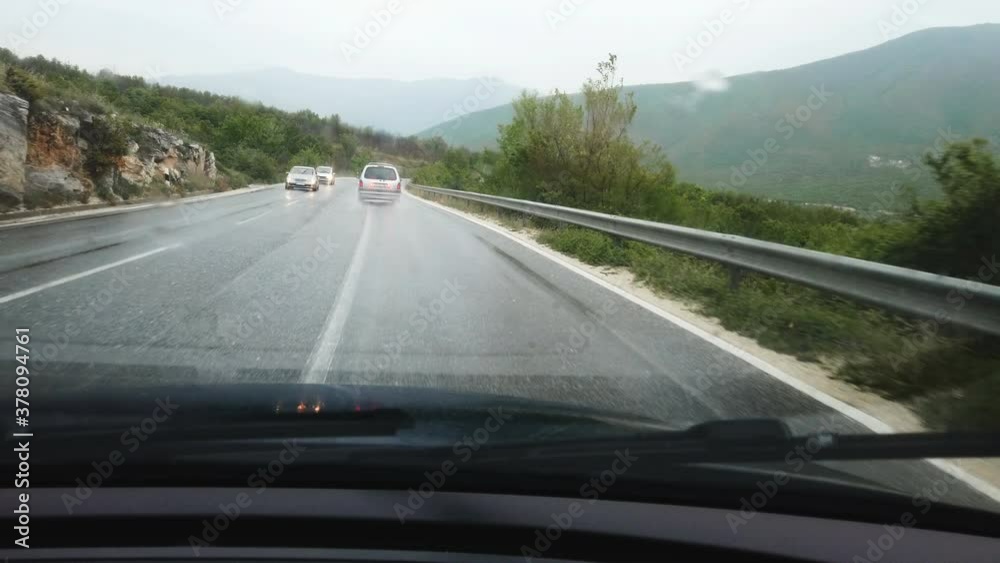 Rainy Drive on Wet Mountain highway road Rainy Drive on Wet Mountain highway road