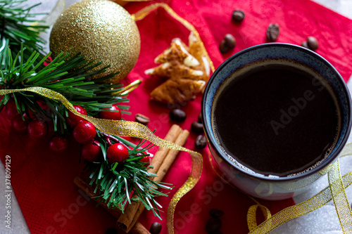 Christmas coffee hot drink in mug with cinnamon sticks flat lay morning drink in cup with new year decorations around